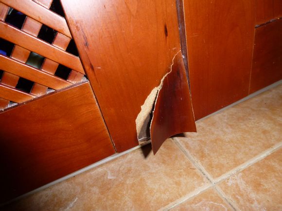 请问现在厨房的橱柜用啥材质好啊?实木时间长