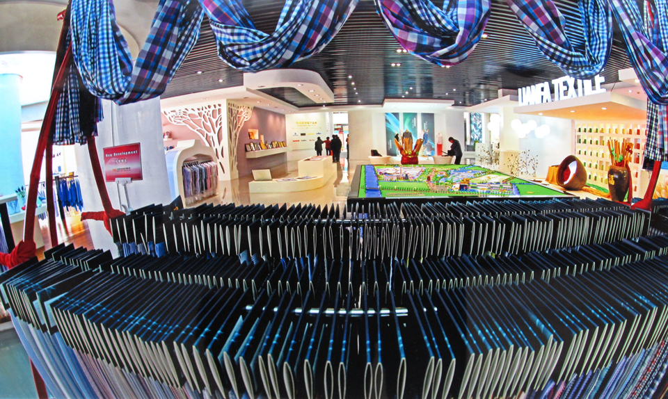 标题 ：《南通纺织扬名四海》 作者 梁玉飞.jpg