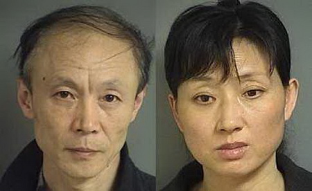 唐鹏父母的入案照