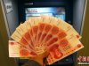 土豪金百元钞遇尴尬:ATM不吃 验钞机不认