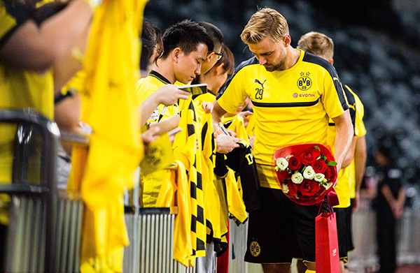 多特蒙德的商业经：有盗版球衣是好事，商业开发不是看天吃饭