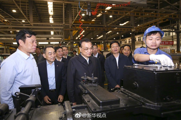 李克强冒雨察看“新”“旧”开封：自贸区要以“新”出彩