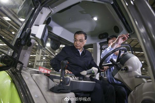 李克强冒雨察看“新”“旧”开封：自贸区要以“新”出彩