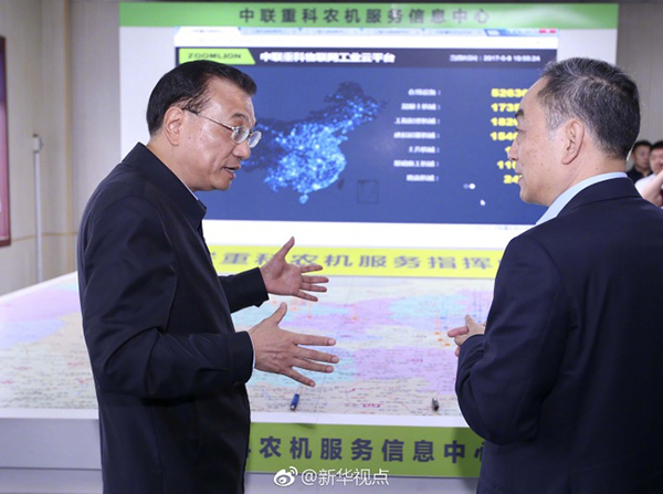 李克强冒雨察看“新”“旧”开封：自贸区要以“新”出彩