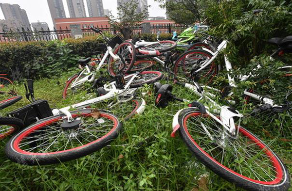 武汉部分路段将禁停共享单车：乱停乱放突出的企业被限制投放