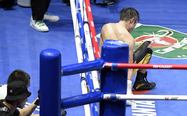 2017年度澎湃人物｜邹市明：上午训练完，就换正装去公司