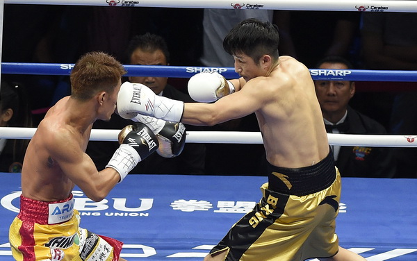 2017年度澎湃人物｜邹市明：上午训练完，就换正装去公司