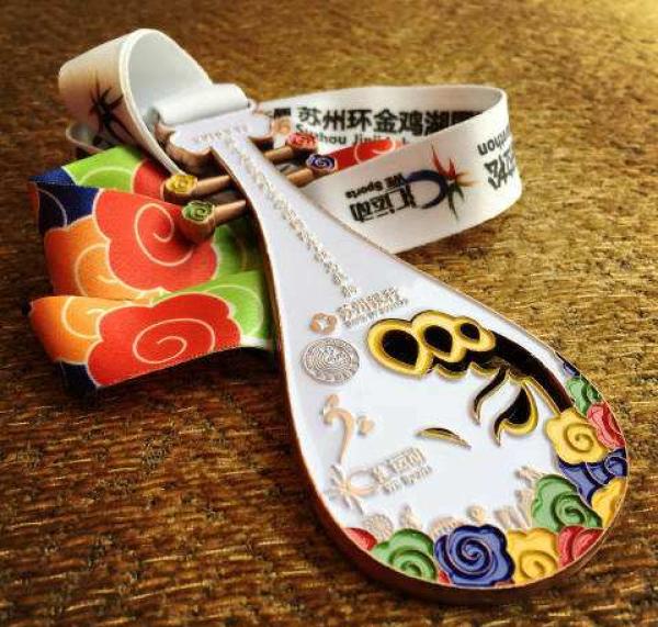 为一款马拉松奖牌也是操碎心，他们把百年西泠印社都请来了