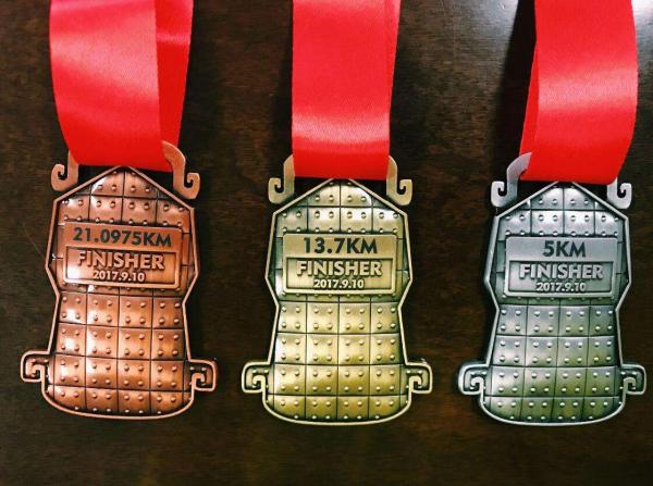 为一款马拉松奖牌也是操碎心，他们把百年西泠印社都请来了