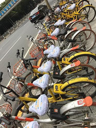 摩拜首次起诉小广告公司：北上广深等城市大量单车被贴小广告