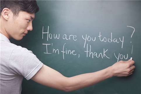 young-man-writing-english-sentences-on-the-blackboard-186478577-58d81dcf3df78c51.jpg