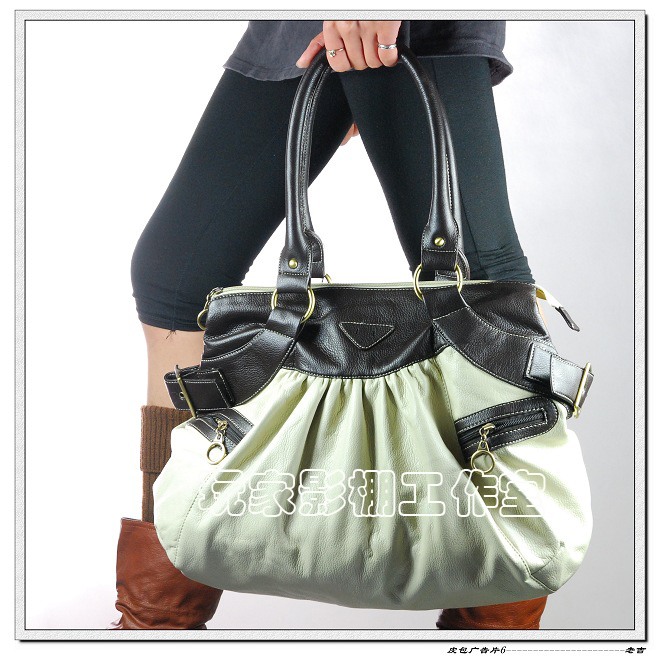 [原创]一张皮包广告片,哪张好一点?请拍砖!