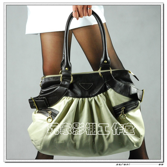 [原创]一张皮包广告片,哪张好一点?请拍砖!