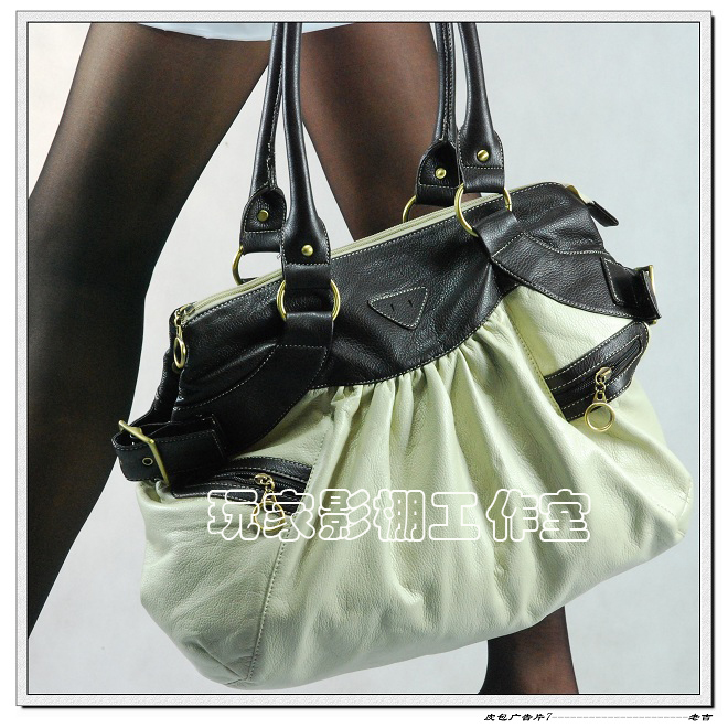 [原创]一张皮包广告片,哪张好一点?请拍砖!