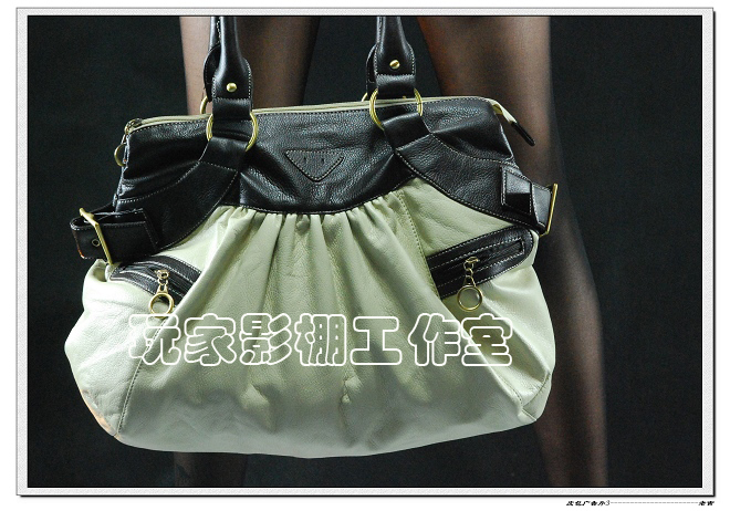 [原创]一张皮包广告片,哪张好一点?请拍砖!