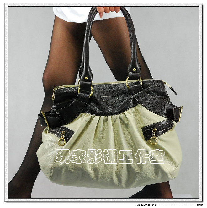 [原创]一张皮包广告片,哪张好一点?请拍砖!