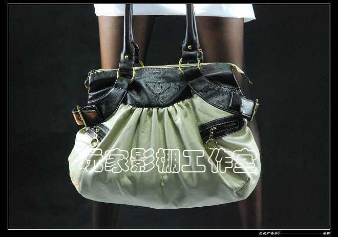 [原创]一张皮包广告片,哪张好一点?请拍砖!